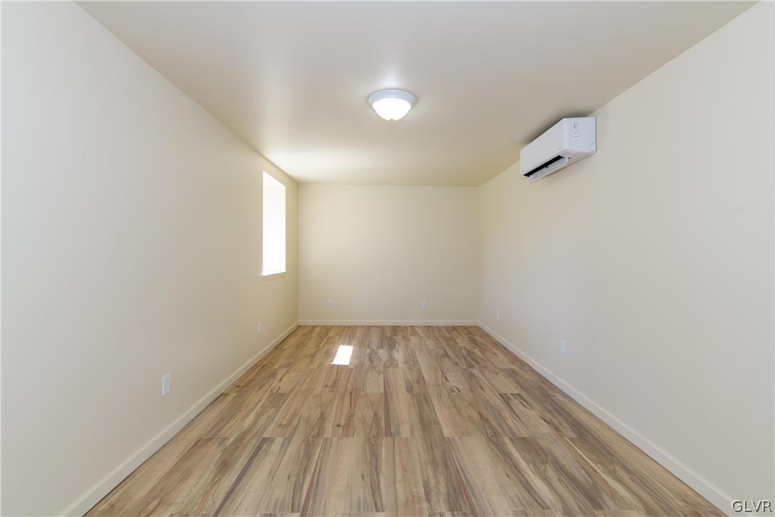 396 Swamp Road Wind Gap, PA 18091 - Photo 30 of 50 a view of an empty room and wooden floor