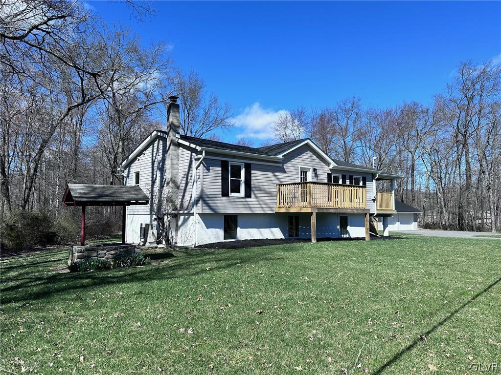 396 Swamp Road Wind Gap, PA 18091 - Photo 3 of 50 a view of a house with a big yard and large trees
