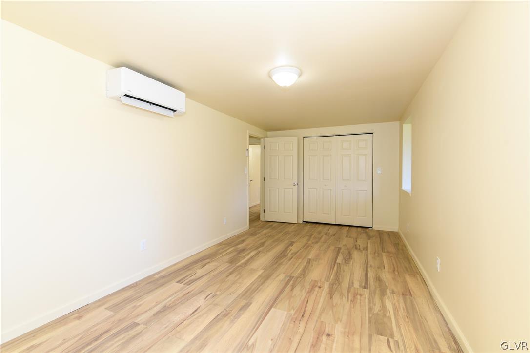 396 Swamp Road Wind Gap, PA 18091 - Photo 31 of 50 a view of a room with wooden floor and a white wall
