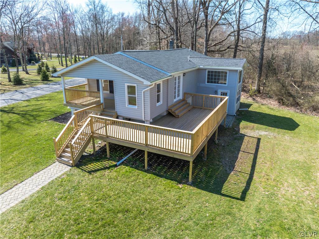 396 Swamp Road Wind Gap, PA 18091 - Photo 33 of 50 a view of a house with a yard and deck