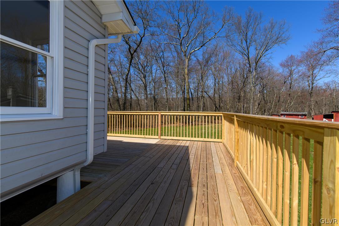 396 Swamp Road Wind Gap, PA 18091 - Photo 48 of 50 a view of deck with wooden floor and fence and floor