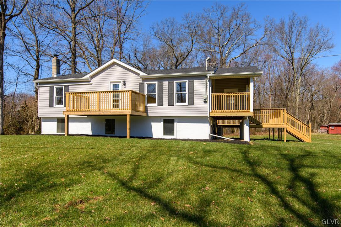 396 Swamp Road Wind Gap, PA 18091 - Photo 5 of 50 a front view of a house with a yard