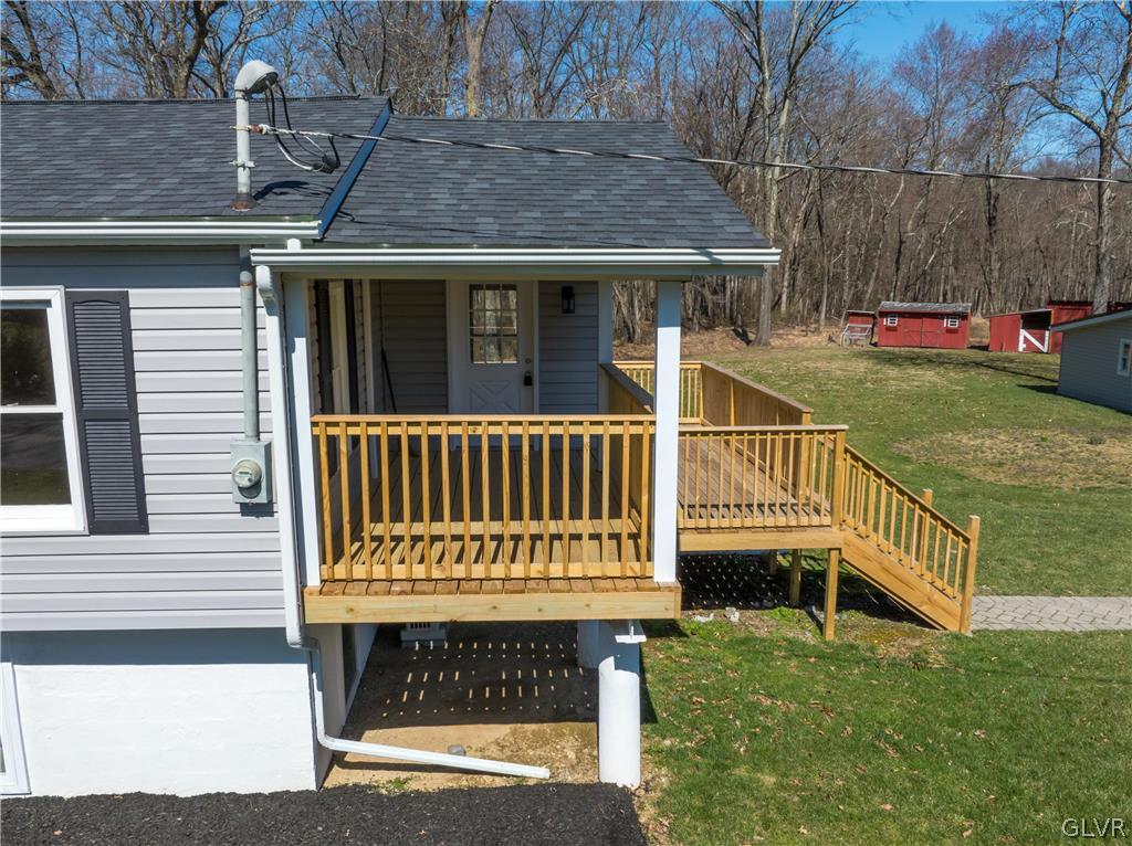 396 Swamp Road Wind Gap, PA 18091 - Photo 6 of 50 a view of a house with a wooden deck
