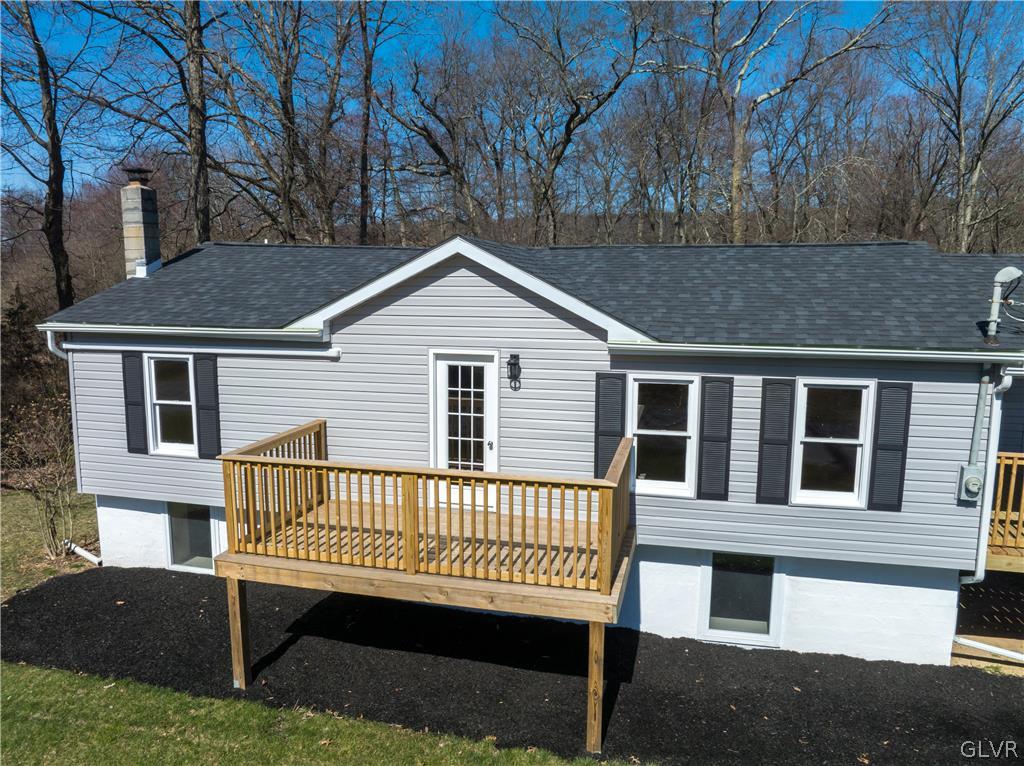 396 Swamp Road Wind Gap, PA 18091 - Photo 7 of 50 a view of a house with a roof deck