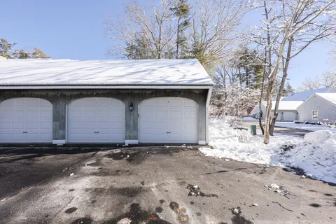 a view of a house with backyard