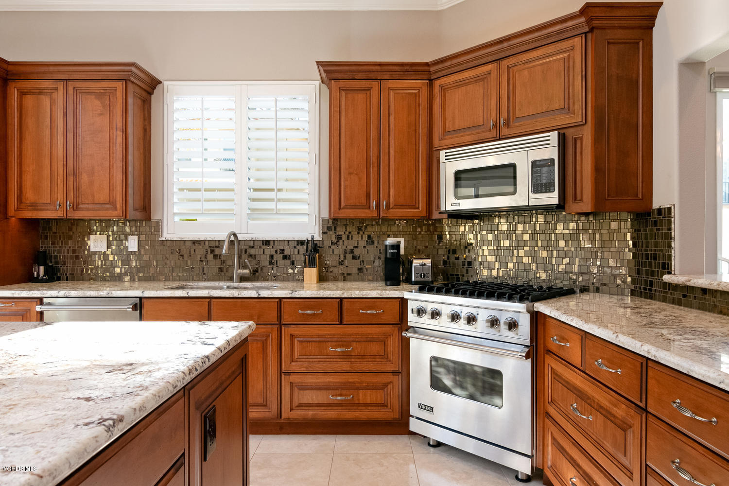 1121 Corte Riviera Camarillo, CA 93010 - Photo 2 of 35 a kitchen with granite countertop cabinets stainless steel appliances a sink and a window