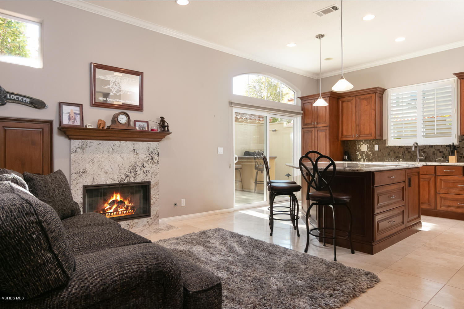 1121 Corte Riviera Camarillo, CA 93010 - Photo 11 of 35 a living room with furniture and a fireplace
