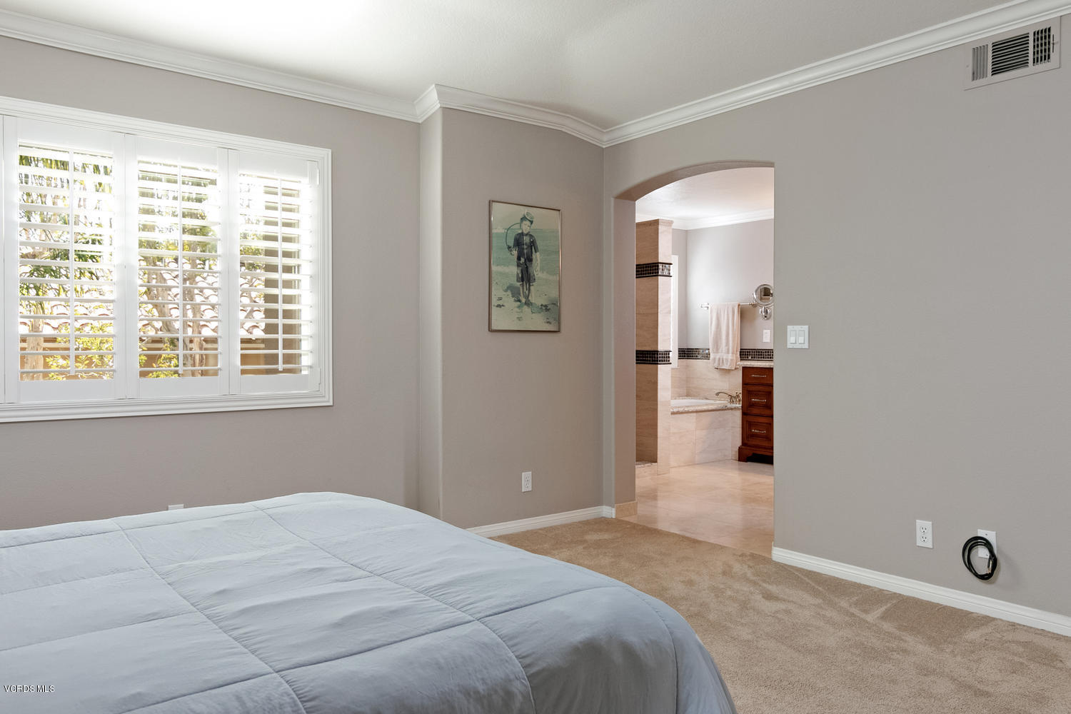 1121 Corte Riviera Camarillo, CA 93010 - Photo 17 of 35 a bedroom with a bed and a window