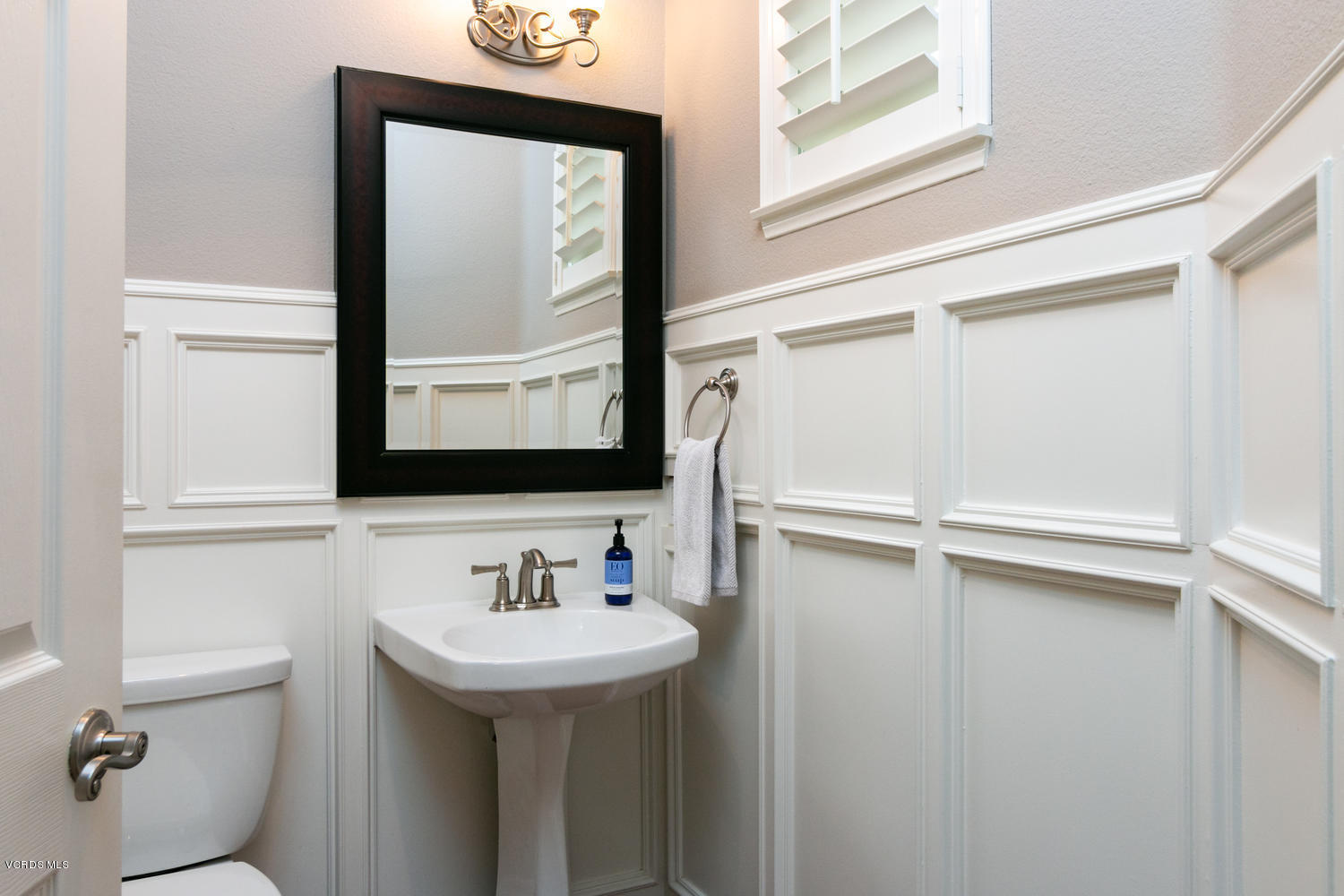 1121 Corte Riviera Camarillo, CA 93010 - Photo 27 of 35 a bathroom with a sink and a mirror