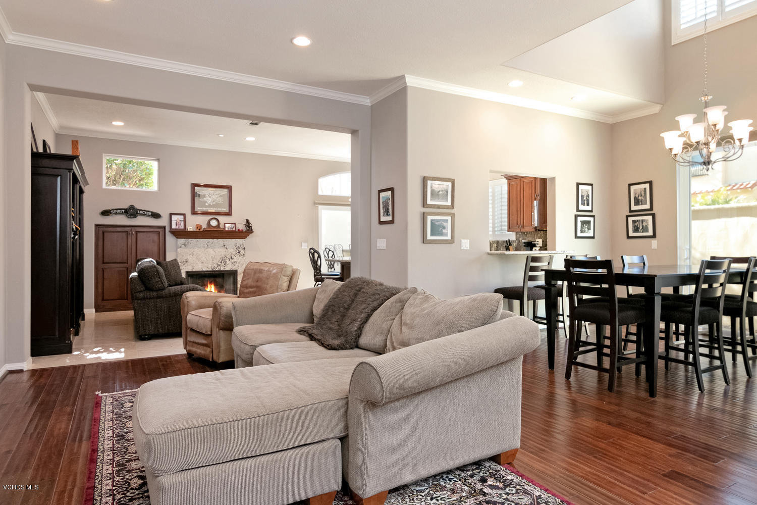 1121 Corte Riviera Camarillo, CA 93010 - Photo 5 of 35 a living room with furniture wooden floor and a chandelier