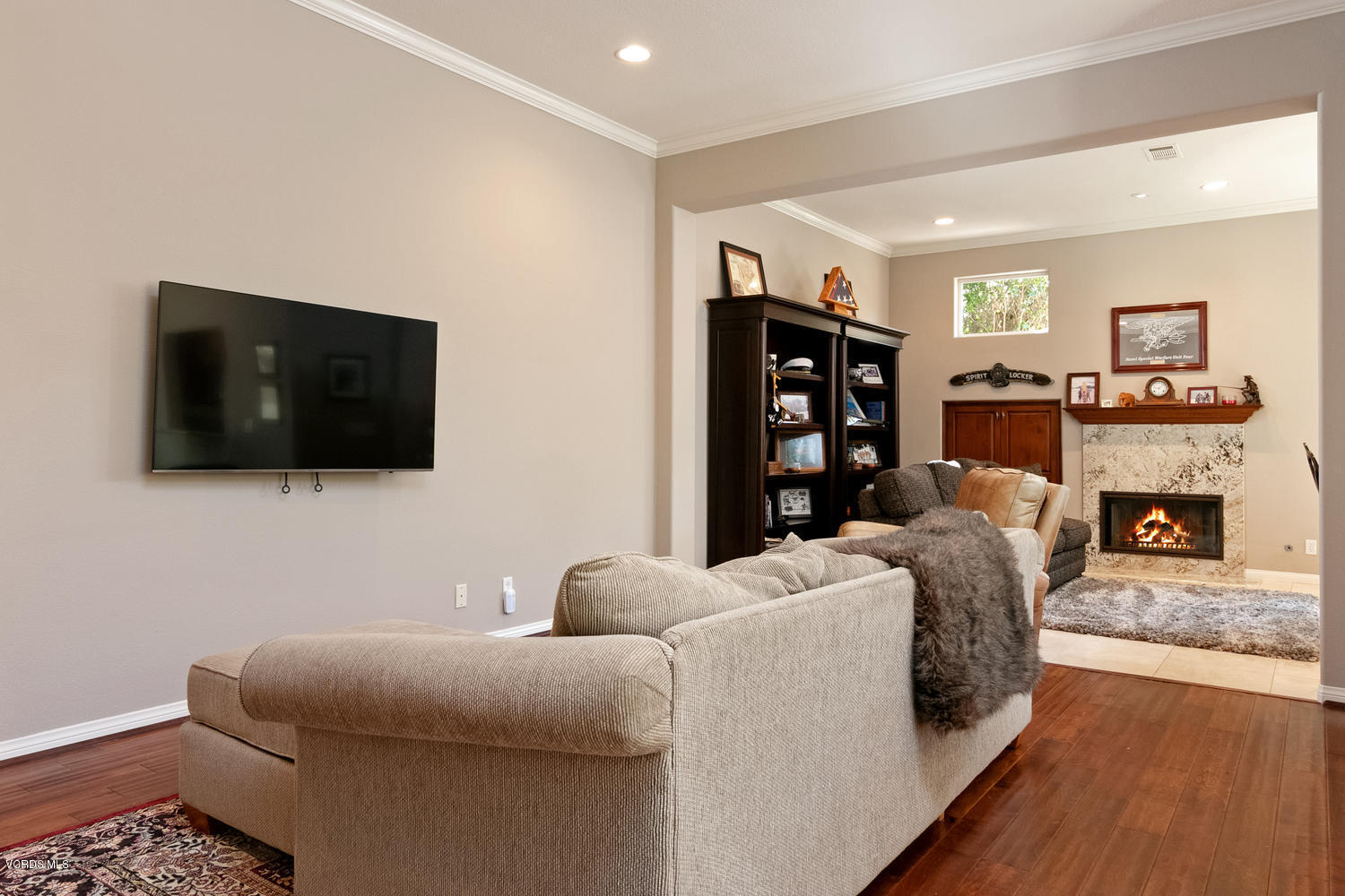 1121 Corte Riviera Camarillo, CA 93010 - Photo 6 of 35 a living room with furniture and a flat screen tv