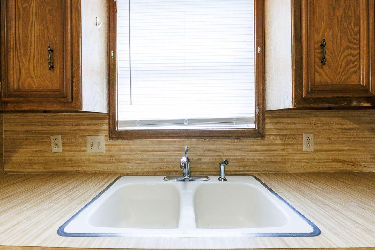 6411 York Drive, Unit B Lubbock, TX 79414 - Photo 15 of 28 a bathroom with a sink and a bathtub