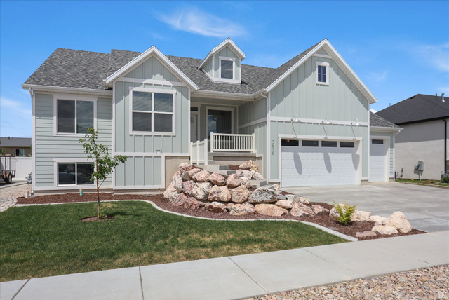 3636 West 910 South Syracuse, UT 84075 - Photo 70 of 70 Contemporary residence featuring light green siding and a grey shingle roof