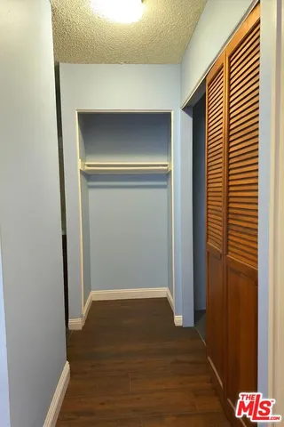 a view of a fireplace and a window