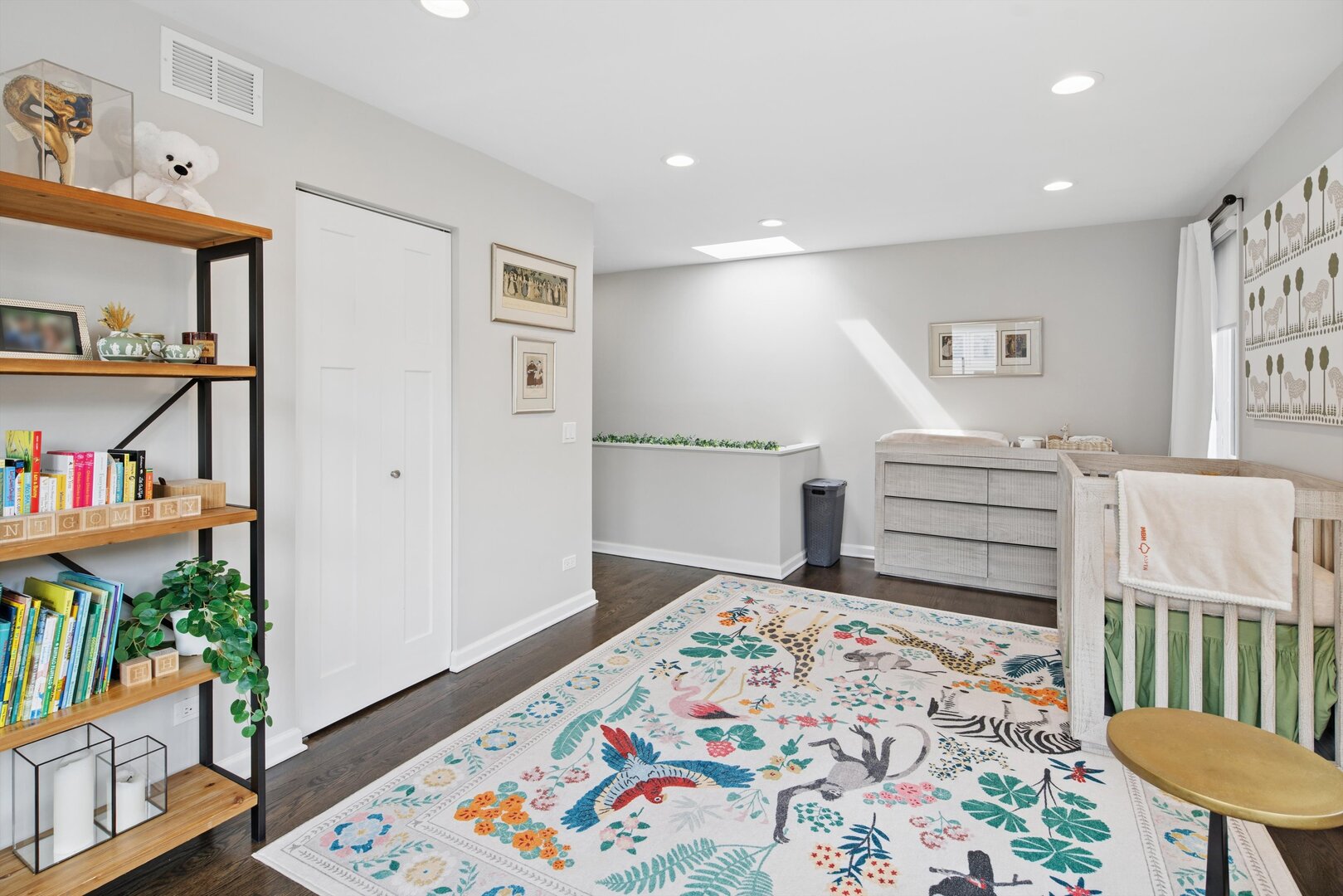 2222 North Racine Avenue, Unit 16 Chicago, IL 60614 - Photo 26 of 32 a bedroom with furniture and a book shelf