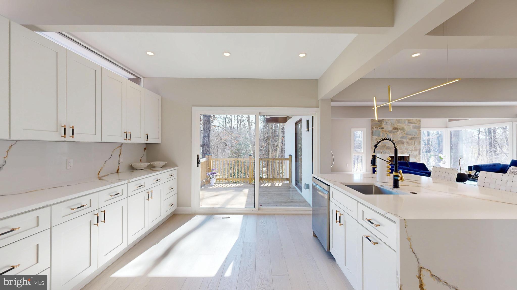 11101 Wedge Drive Reston, VA 20190 - Photo 14 of 55 a kitchen with counter top space and sink