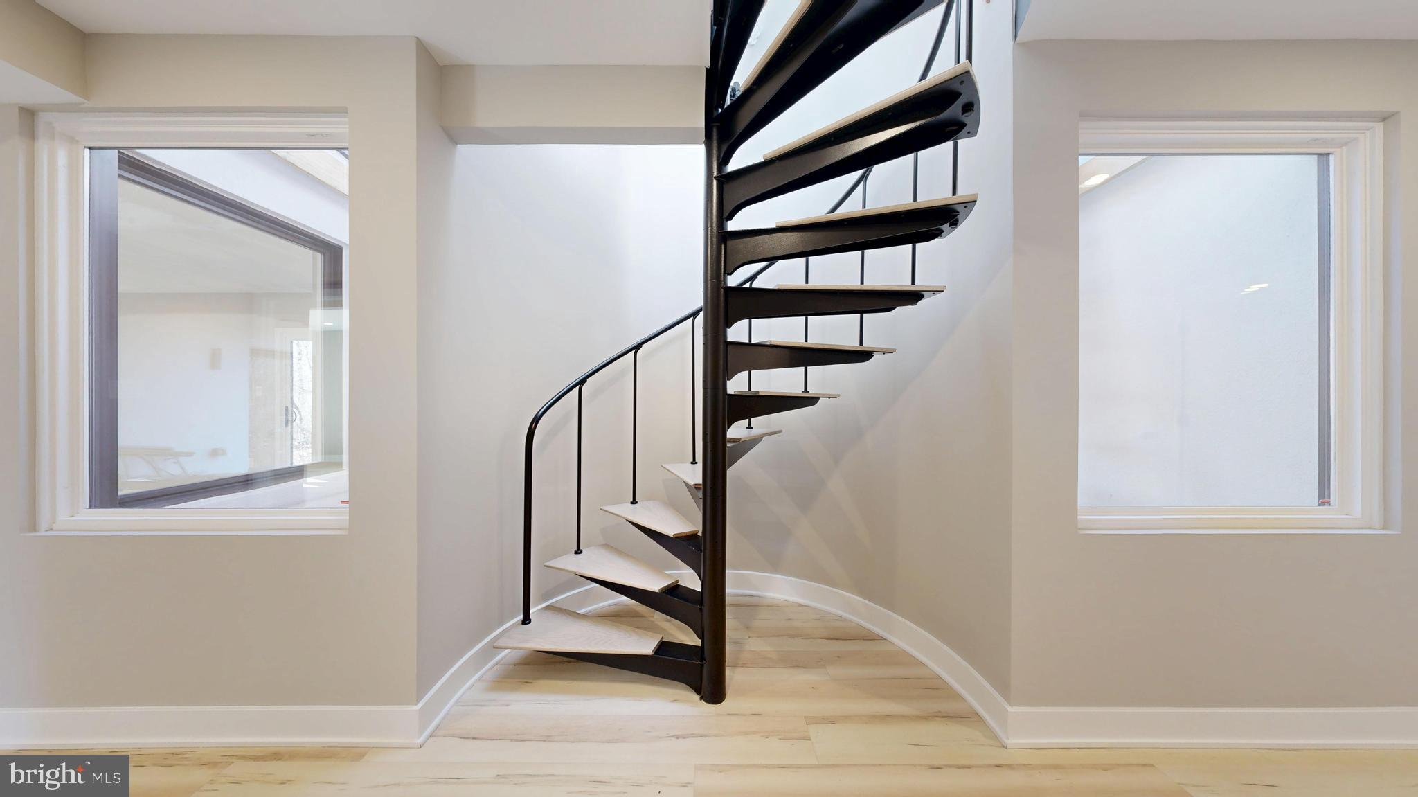 11101 Wedge Drive Reston, VA 20190 - Photo 31 of 55 a view of entryway with wooden floor and stairs