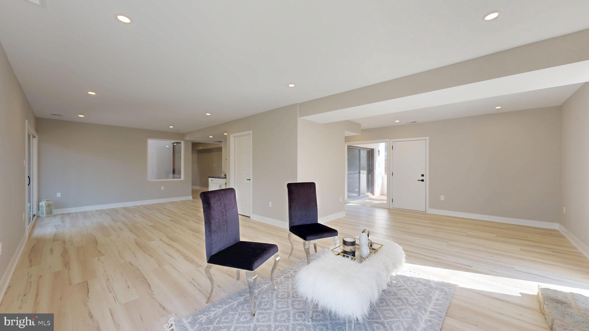 11101 Wedge Drive Reston, VA 20190 - Photo 35 of 55 a living room with furniture and wooden floor