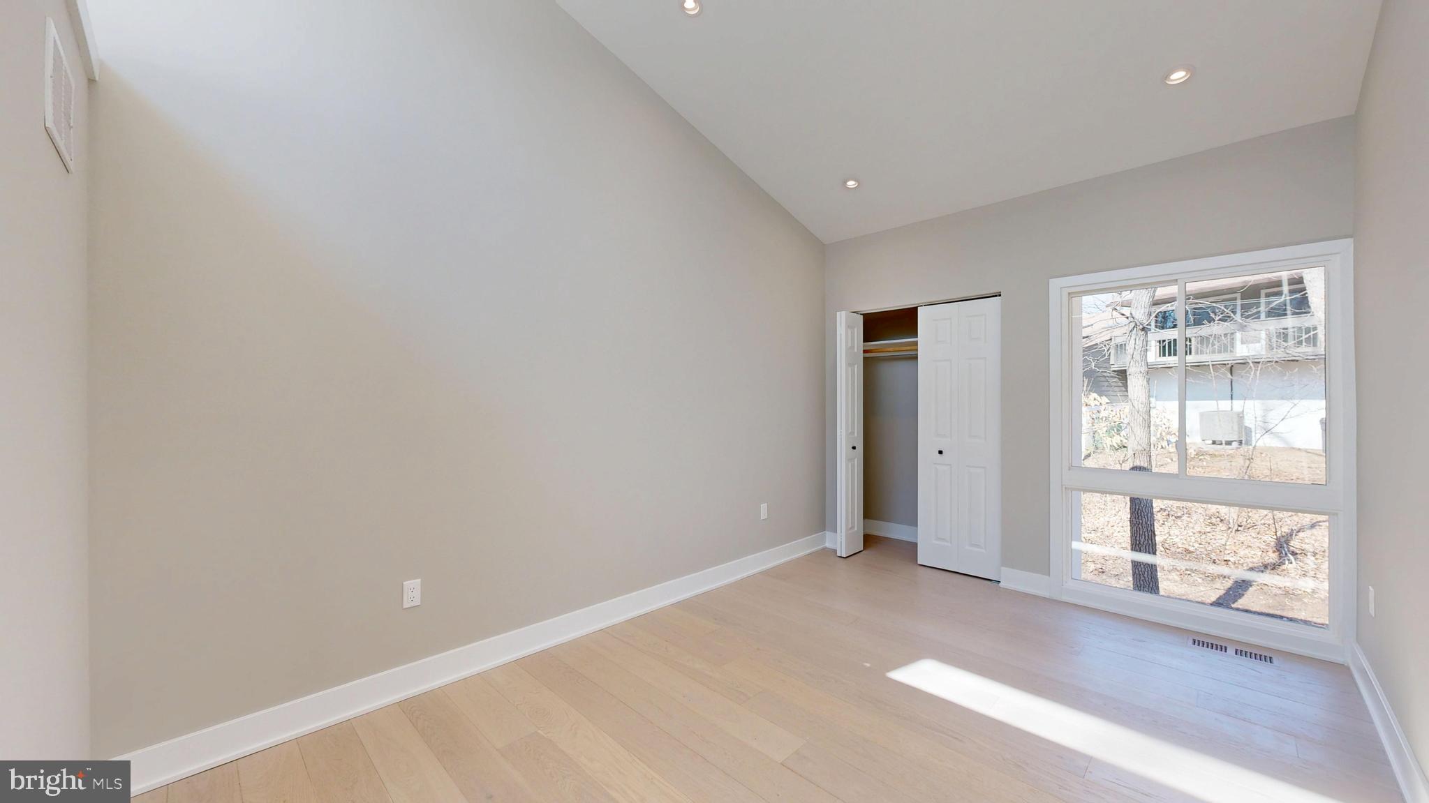11101 Wedge Drive Reston, VA 20190 - Photo 39 of 55 a view of an empty room with a window