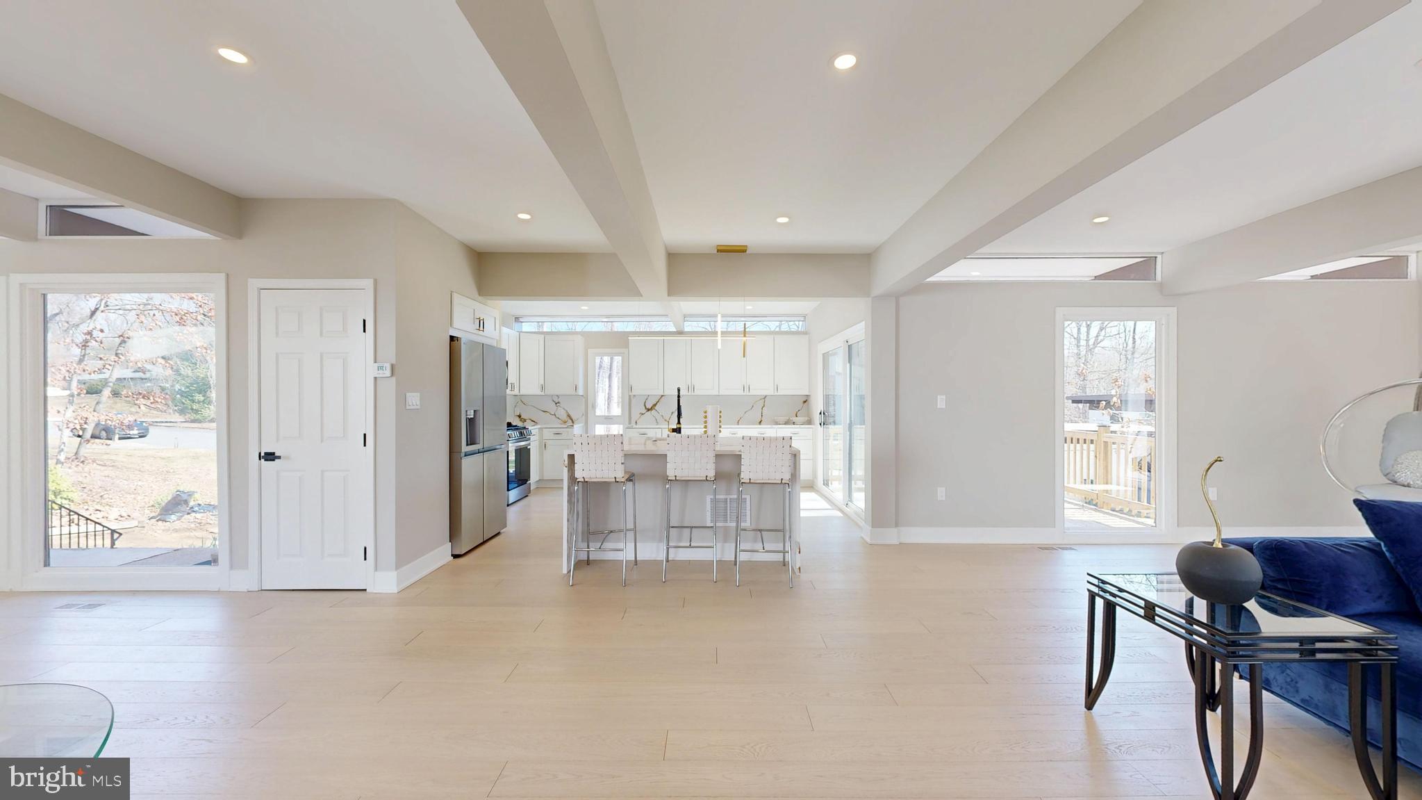 11101 Wedge Drive Reston, VA 20190 - Photo 4 of 55 a living room with furniture and a large window