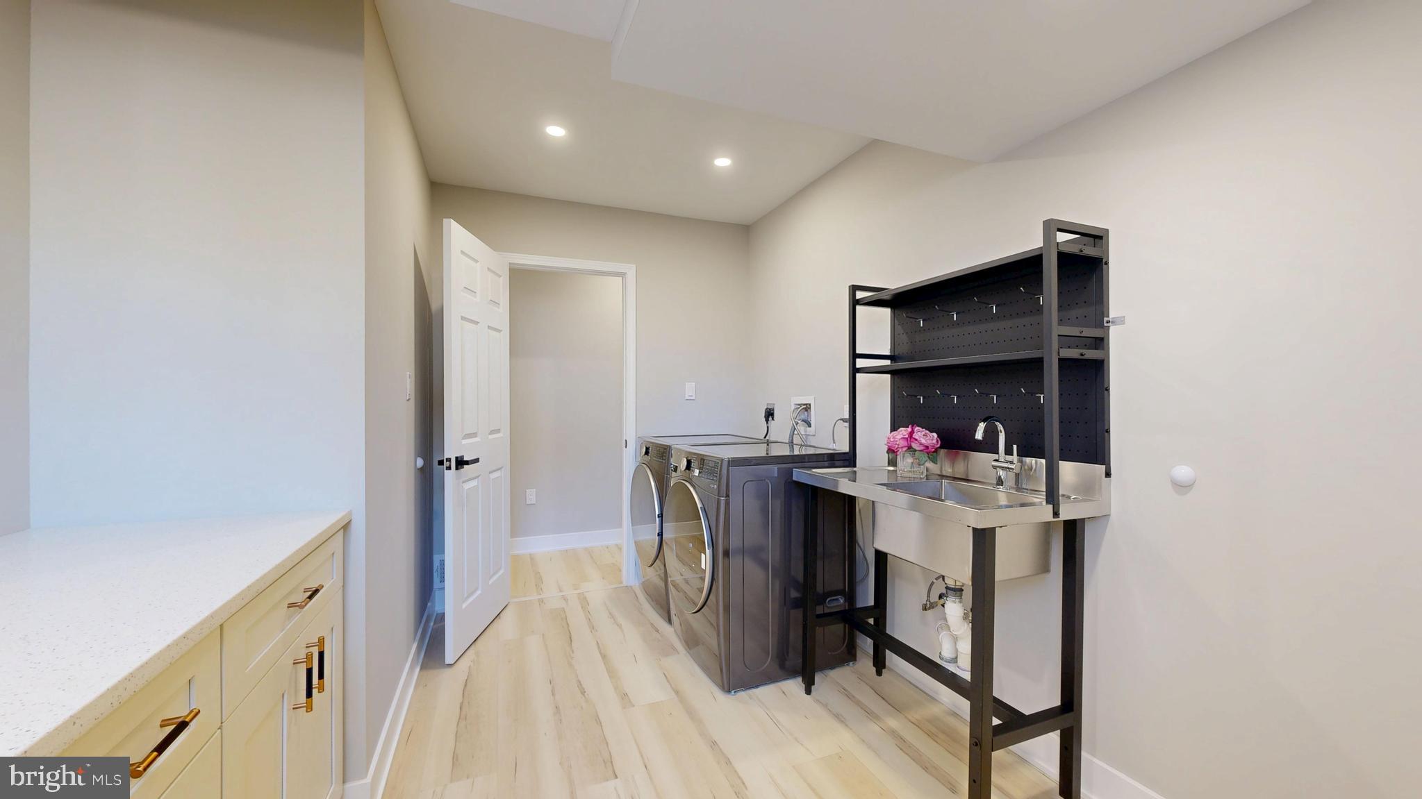 11101 Wedge Drive Reston, VA 20190 - Photo 47 of 55 a view of storage utility and utility room in a house