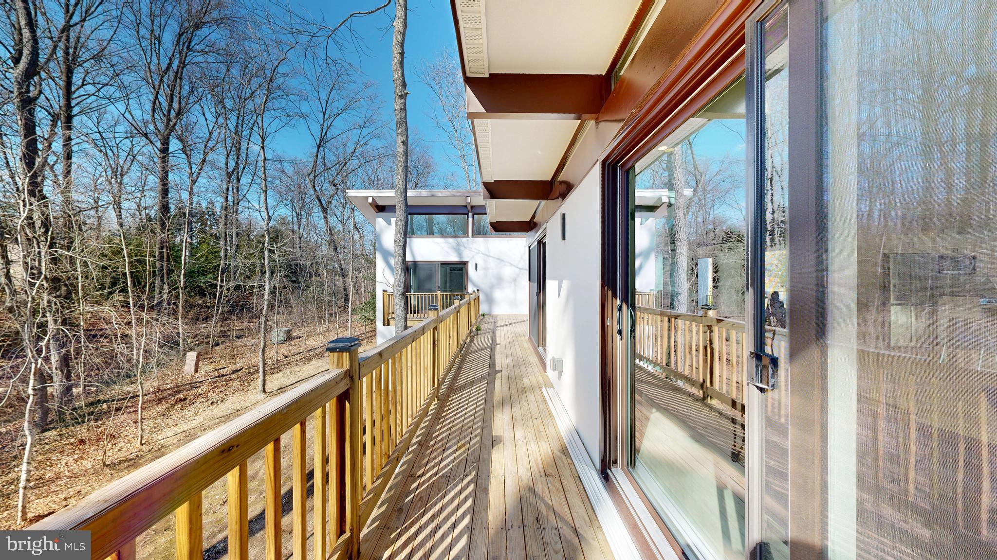 11101 Wedge Drive Reston, VA 20190 - Photo 50 of 55 a view of balcony with wooden floor and door