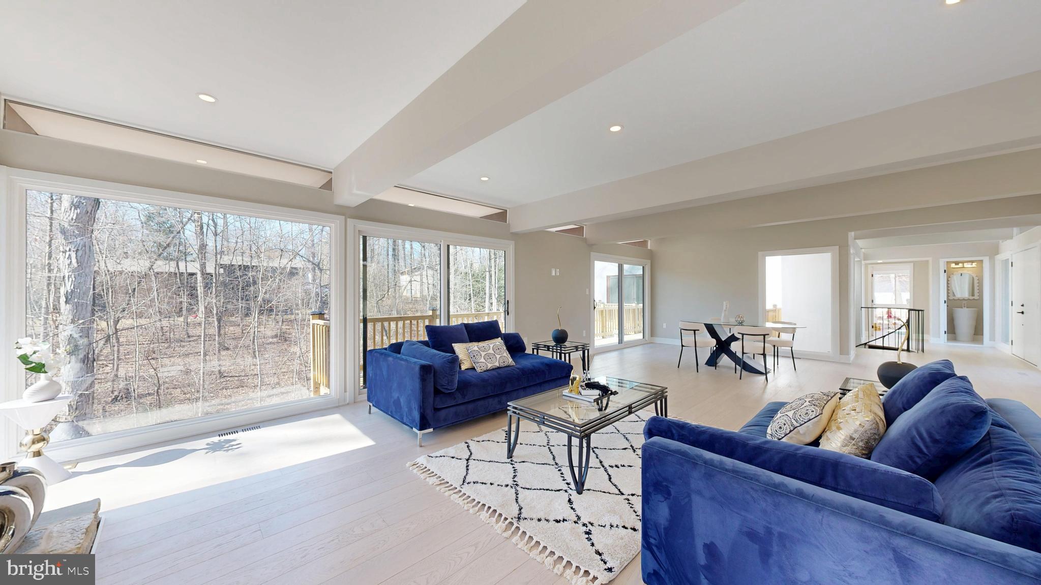 11101 Wedge Drive Reston, VA 20190 - Photo 9 of 55 a living room with furniture and a large window