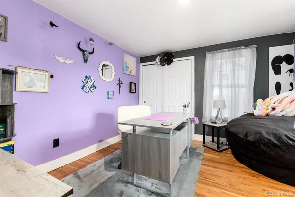 a room with a bed and a window