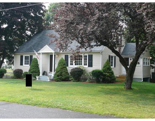 20 Ellery Street Springfield, MA 01129 - Photo 1 of 20 a front view of a house with a yard and tree