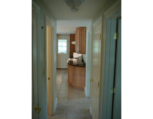 20 Ellery Street Springfield, MA 01129 - Photo 11 of 20 a room with a sink and mirror