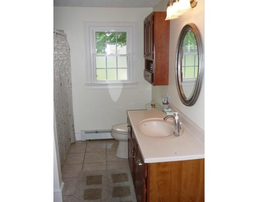 20 Ellery Street Springfield, MA 01129 - Photo 12 of 20 a bathroom with a sink and a mirror
