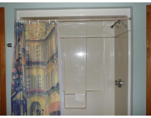 20 Ellery Street Springfield, MA 01129 - Photo 15 of 20 a bathroom with a glass shower door