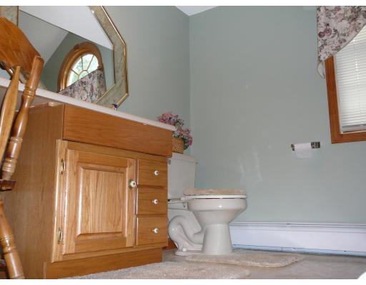 20 Ellery Street Springfield, MA 01129 - Photo 17 of 20 a bathroom with a toilet and a window