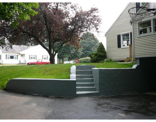 20 Ellery Street Springfield, MA 01129 - Photo 5 of 20 a view of a bench in a backyard