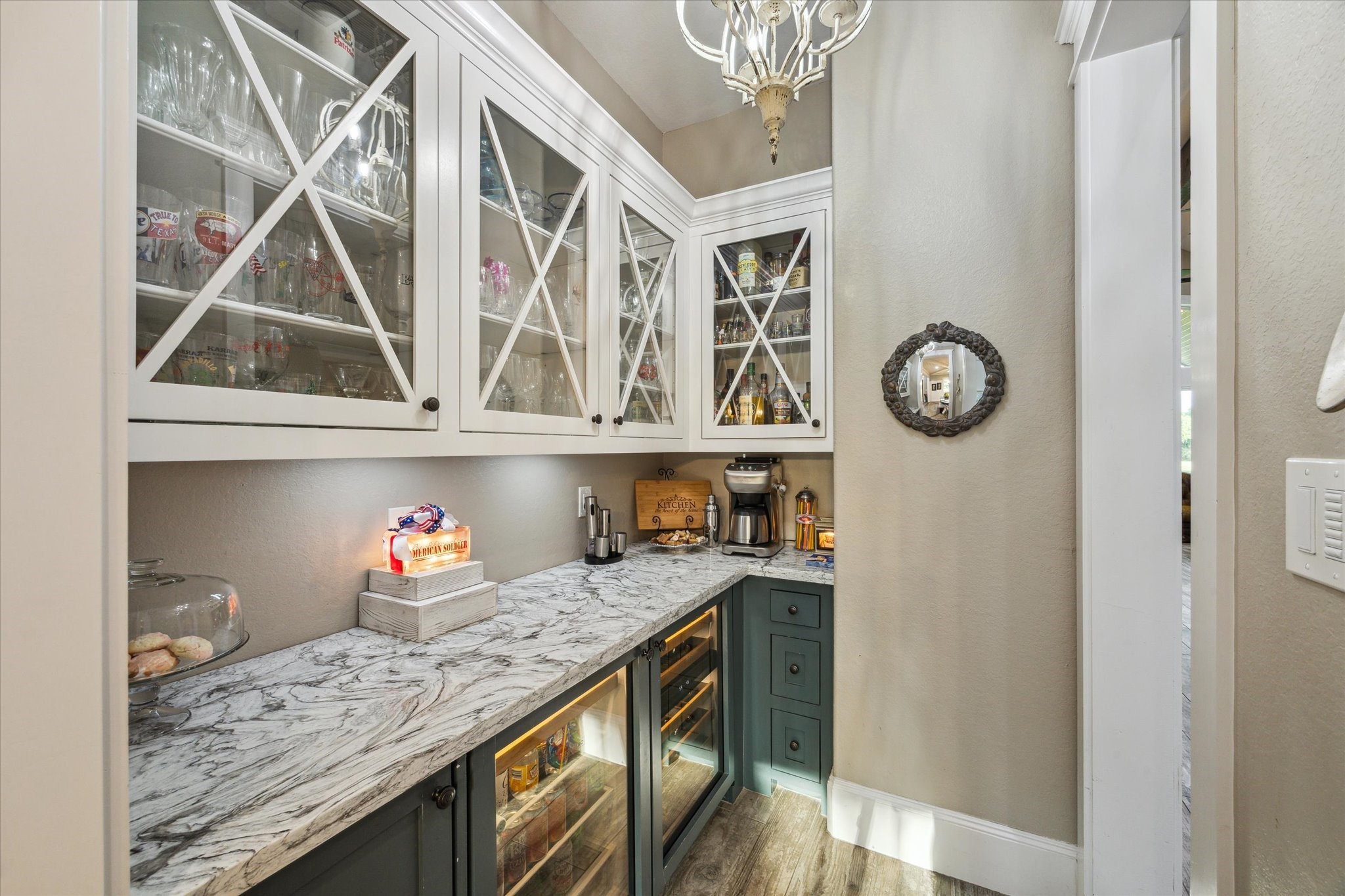1255 Bronco Trail Angleton, TX 77515 - Photo 11 of 50 a kitchen with granite countertop lots of clutter and stainless steel appliances
