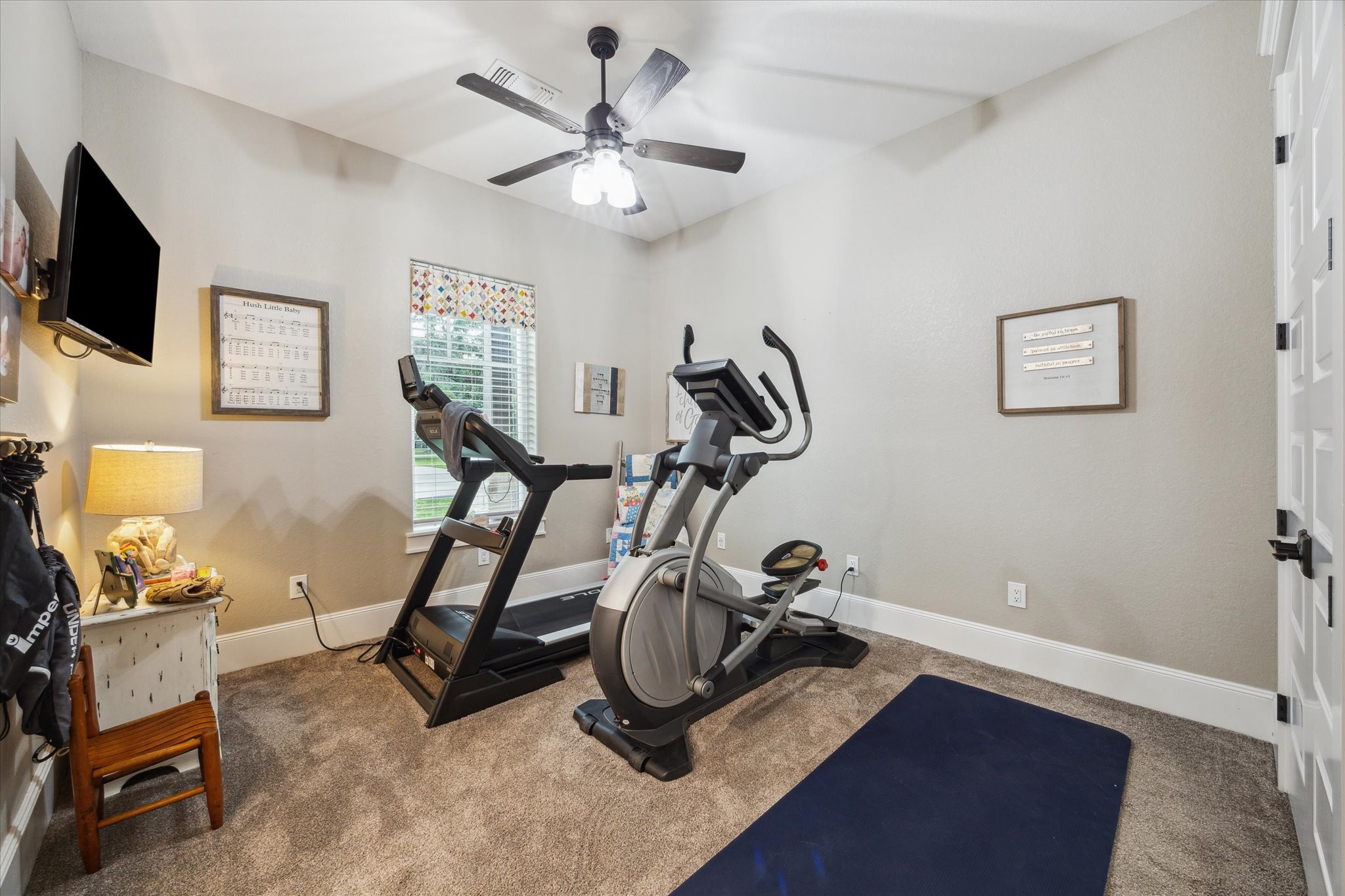 1255 Bronco Trail Angleton, TX 77515 - Photo 22 of 50 a view of a room with gym equipment