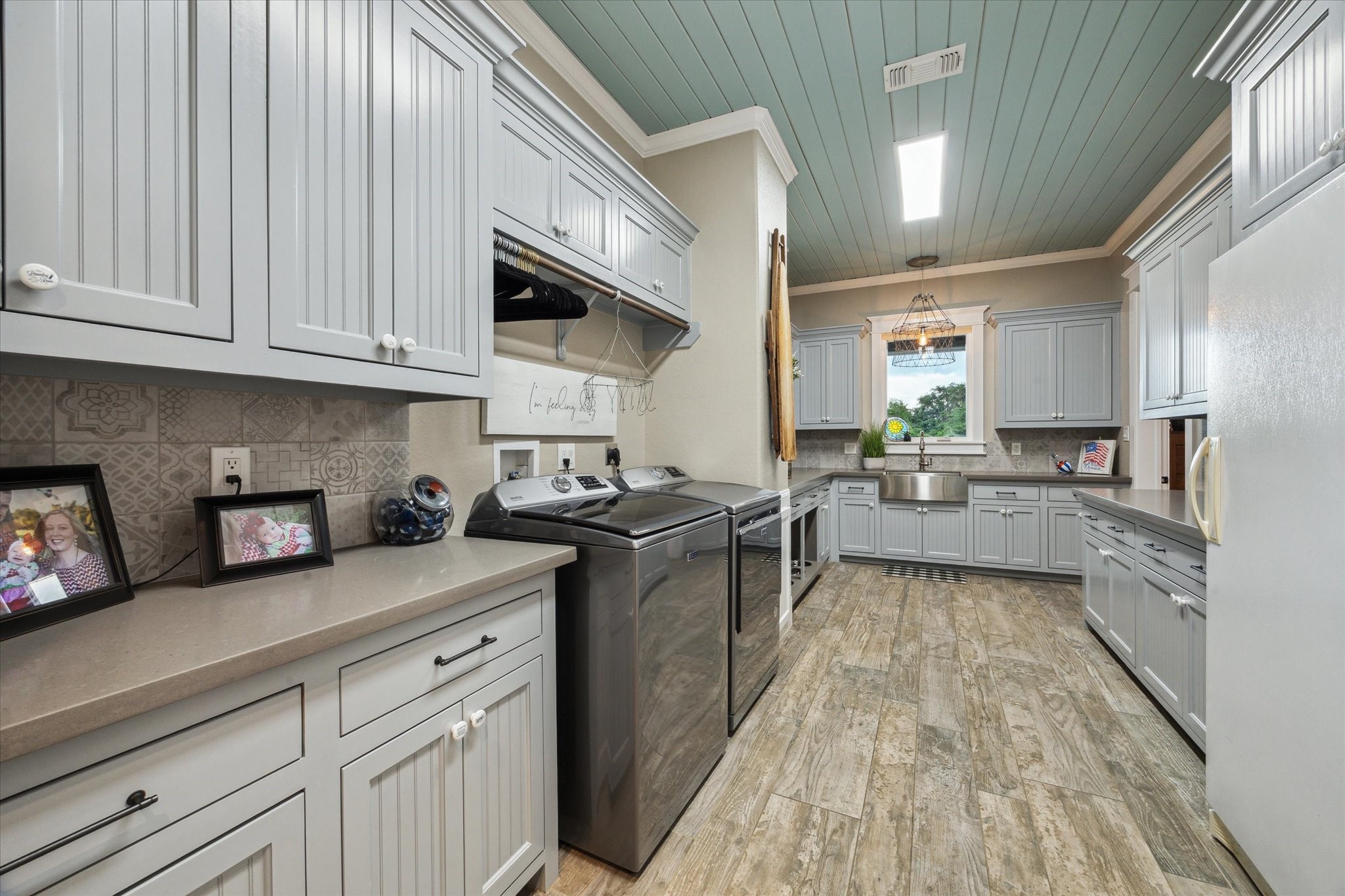 1255 Bronco Trail Angleton, TX 77515 - Photo 24 of 50 a kitchen with a sink and cabinets