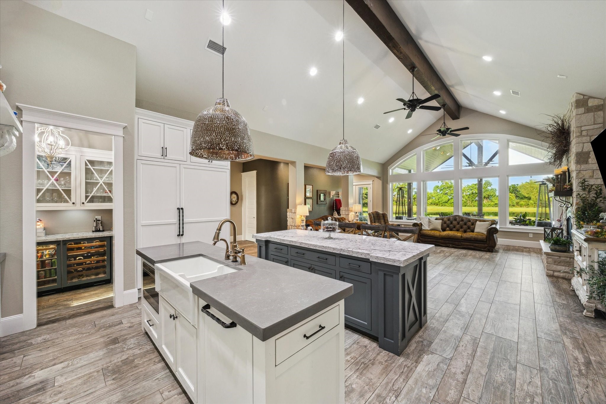 1255 Bronco Trail Angleton, TX 77515 - Photo 10 of 50 a kitchen with stainless steel appliances granite countertop a stove and a wooden floors