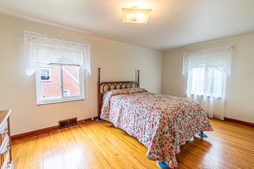 159 Craigdell Road Lower Burrell, PA 15068 - Photo 14 of 31 a bedroom with a bed and a window