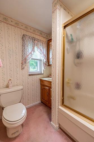 159 Craigdell Road Lower Burrell, PA 15068 - Photo 20 of 31 a bathroom with a granite countertop toilet a sink and a bathtub