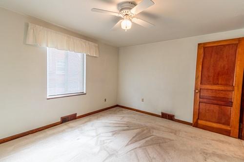 159 Craigdell Road Lower Burrell, PA 15068 - Photo 21 of 31 an empty room with closet and fan