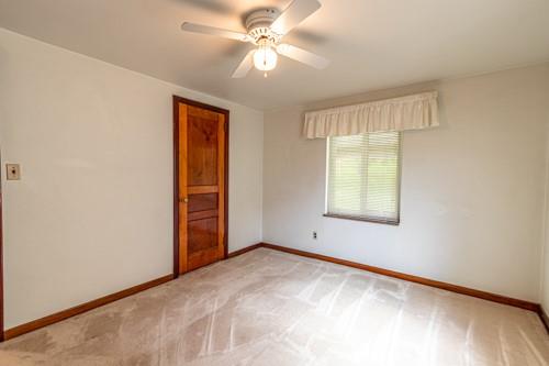 159 Craigdell Road Lower Burrell, PA 15068 - Photo 23 of 31 an empty room with windows and fan