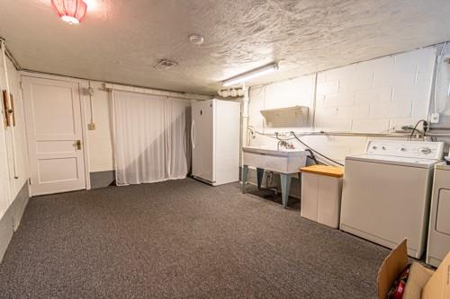 159 Craigdell Road Lower Burrell, PA 15068 - Photo 24 of 31 a view of a storage & utility room with washer and dryer