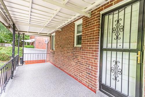 159 Craigdell Road Lower Burrell, PA 15068 - Photo 3 of 31 a view of a porch with wooden floor and floor to ceiling window