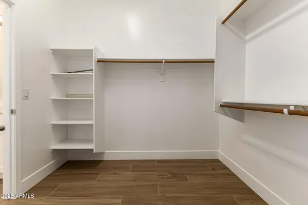 a view of an empty walk in closet