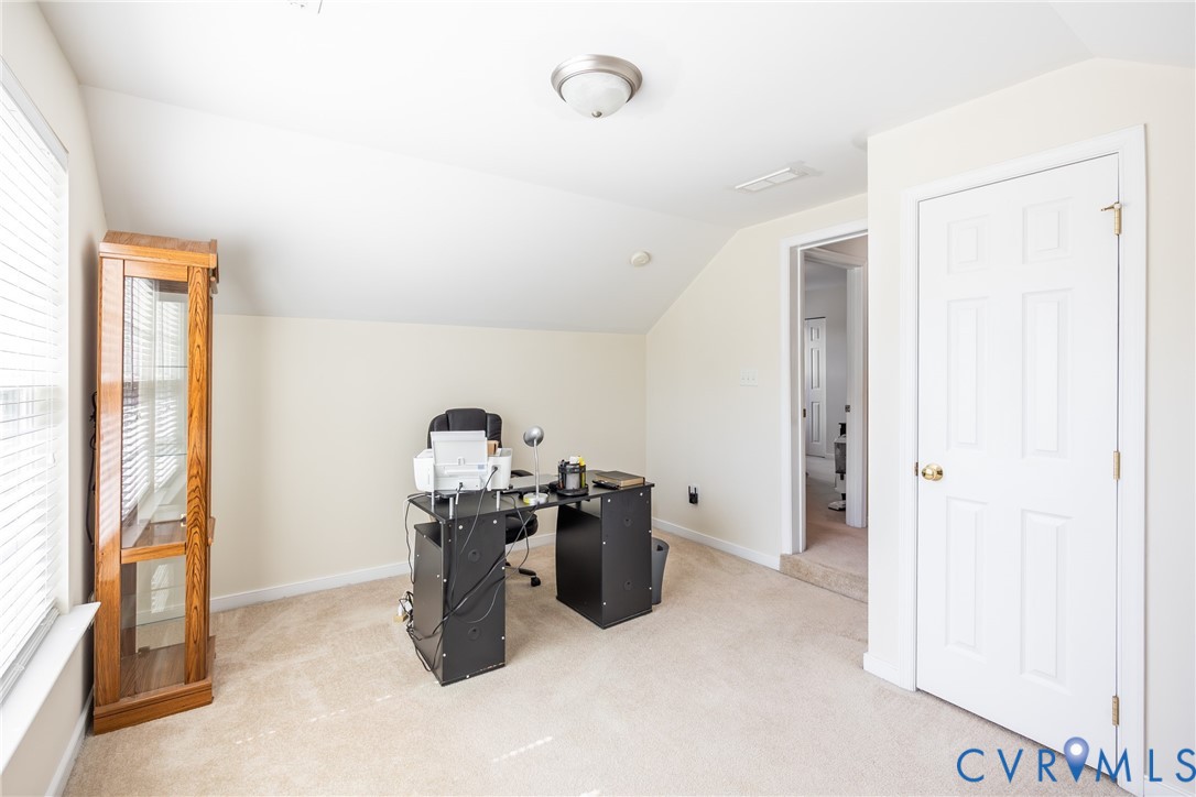 2928 Heather Ridge Drive Henrico, VA 23231 - Photo 28 of 34 Carpeted room with sloped ceilings, a window with