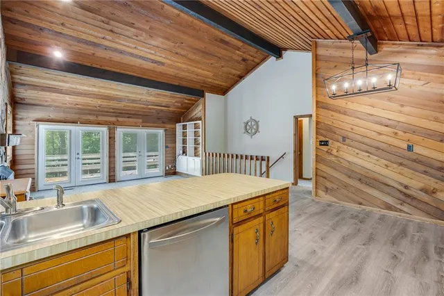 a kitchen with a stove and a sink