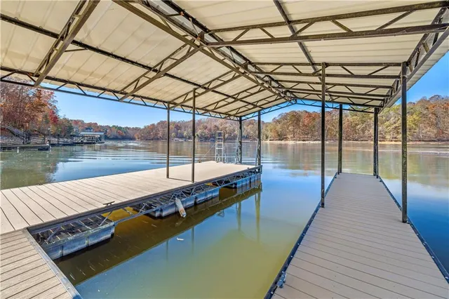 a view of a swimming pool with a lake view