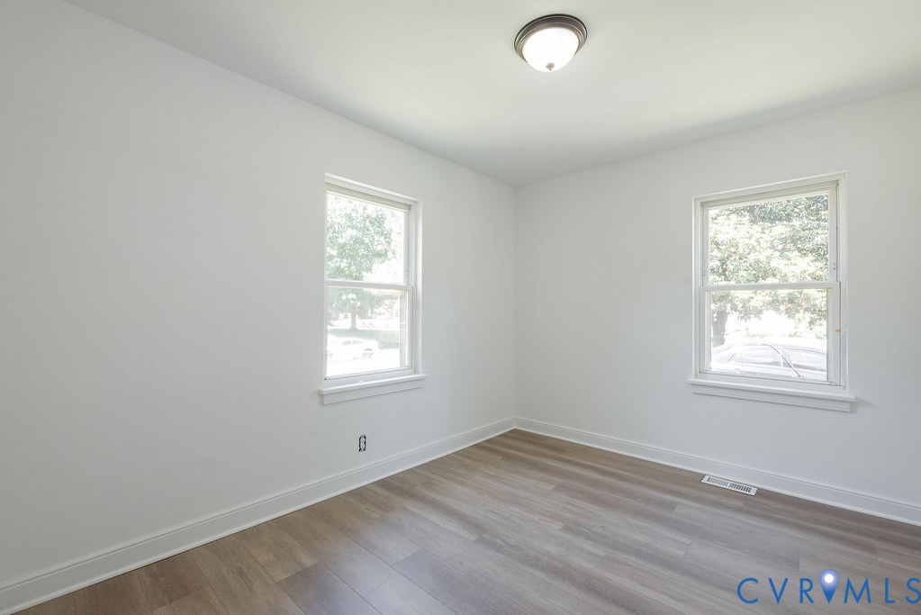 3400 Ryburn Road Richmond, VA 23234 - Photo 21 of 45 Bright interior space featuring two windows with w