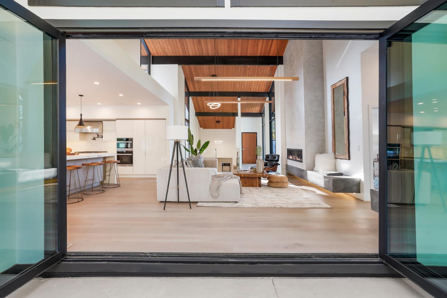 375 Walsh Road Atherton, CA 94027 - Photo 1 of 7 a view of living room with a large window and potted plant